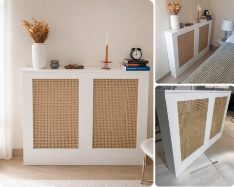 Mueble blanco con paneles de mimbre, decorado con una planta y un candelabro.